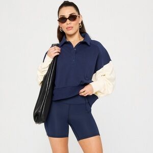 FABLETICS YEAR ROUND TERRY SNAP POLO COLLAR CONTRAST NAVY/BONE SLEEVES PREPPY